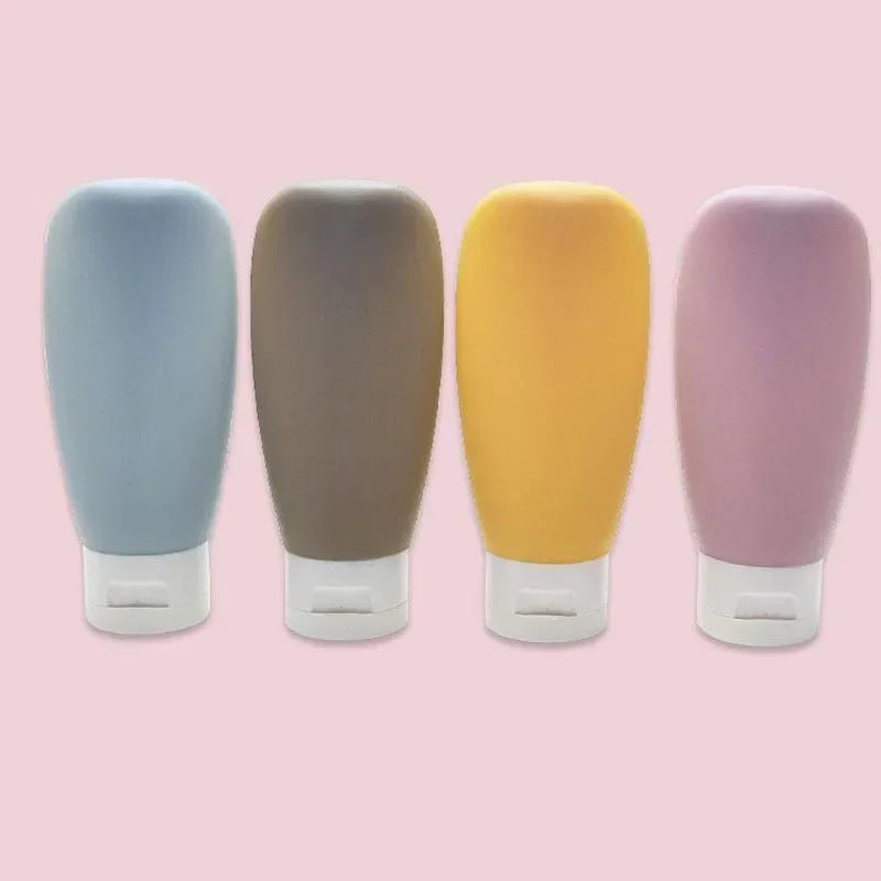 Refillable Travel Bottle Set (4 × 60ml) – Leak-Proof Squeeze Containers for Toiletries