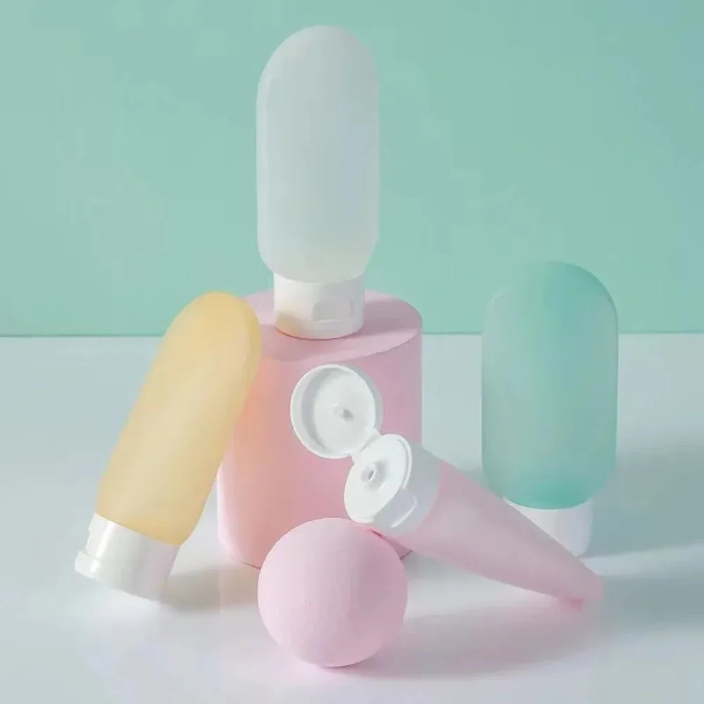 Refillable Travel Bottle Set (4 × 60ml) – Leak-Proof Squeeze Containers for Toiletries